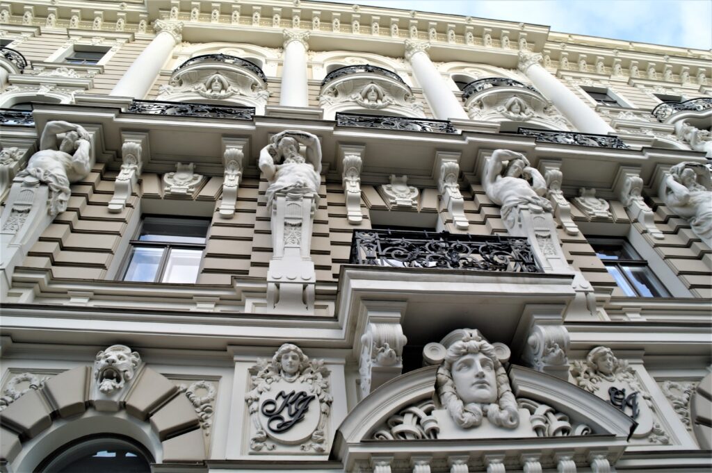 Close up of art nouveau details on a house in Riga.