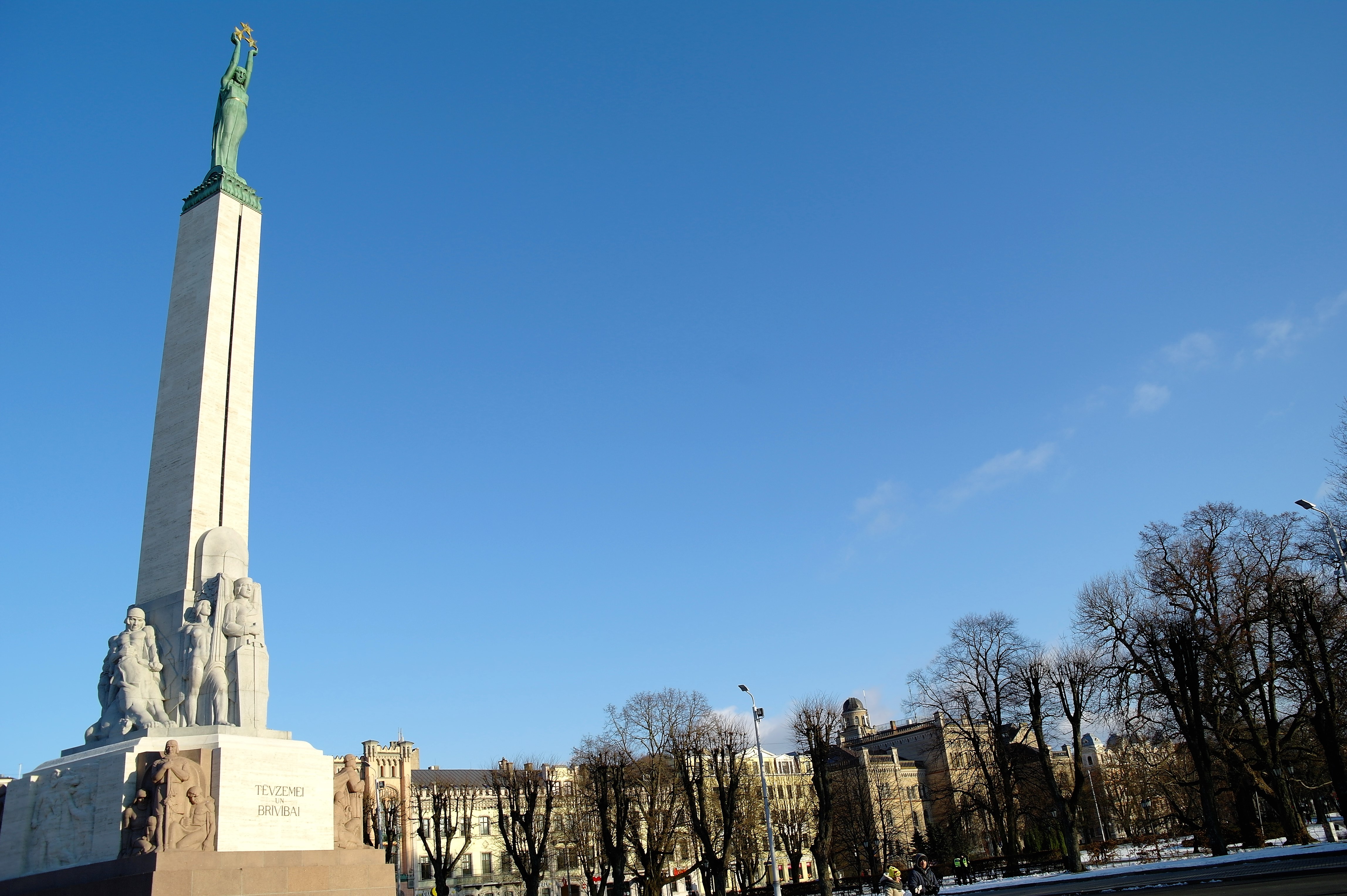 Riga's Freedom monument against blue sky on the Freedom Boulevarde.