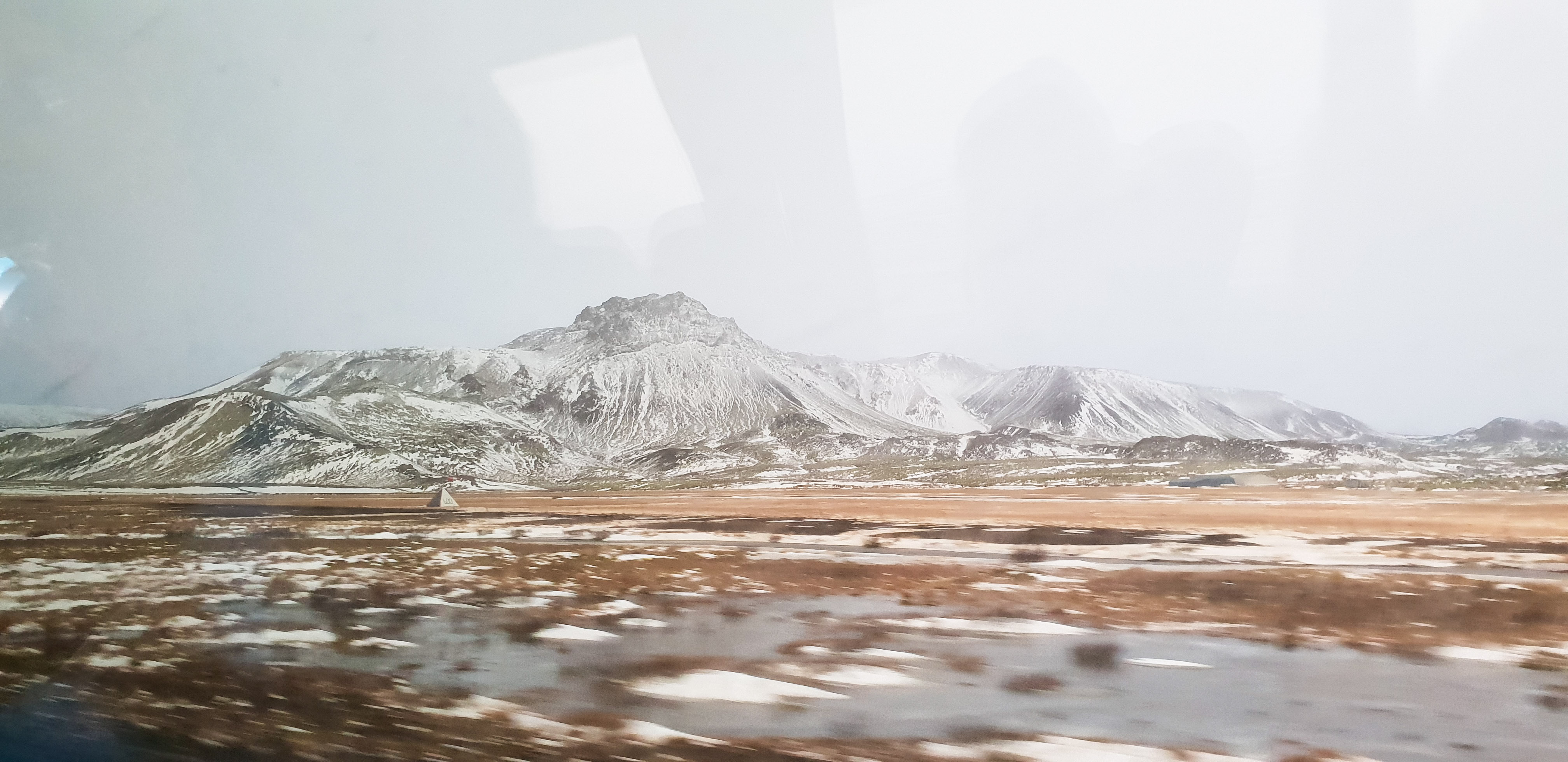 Mid Atlantic Ridge through a bus window with some snow