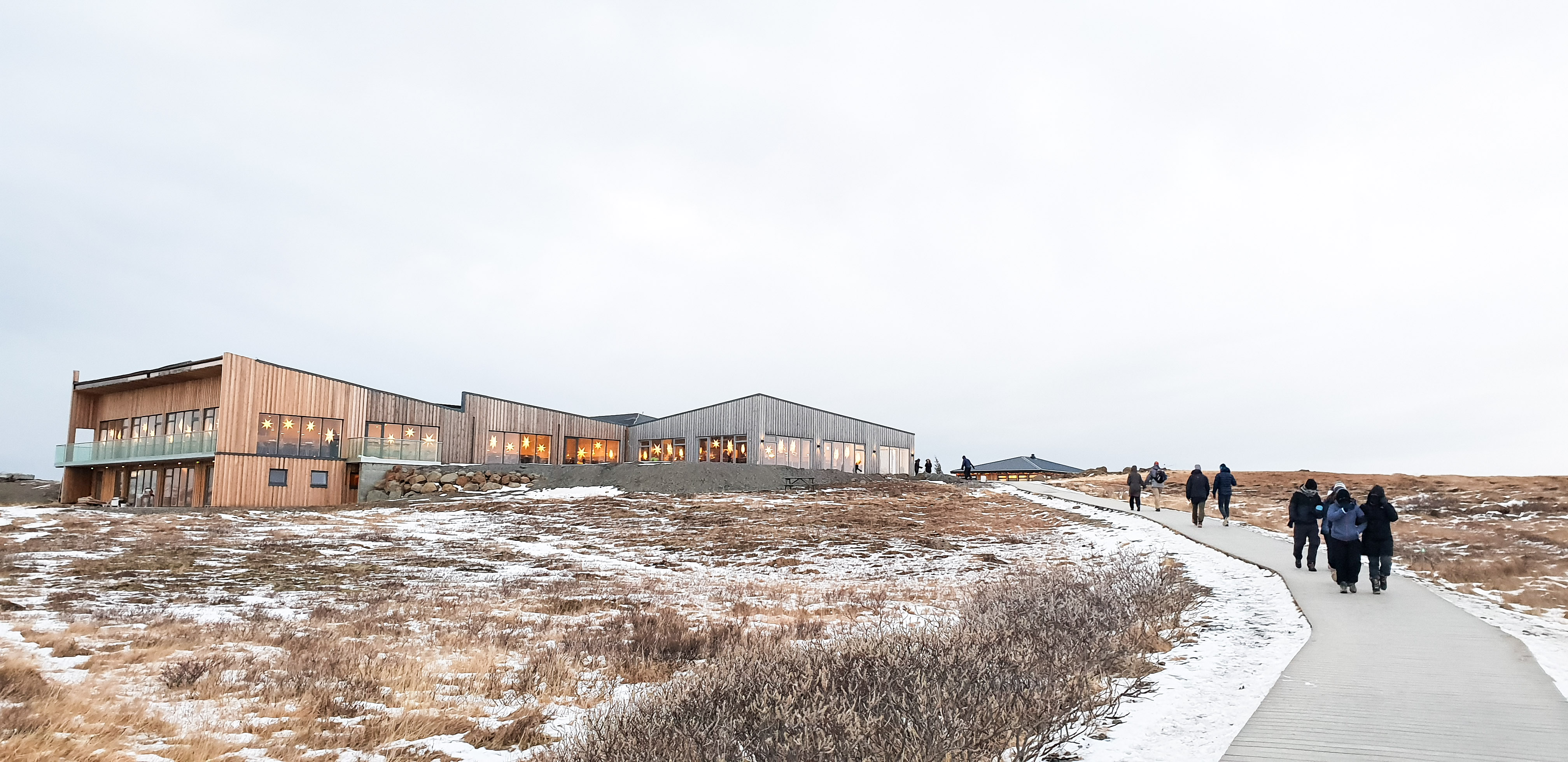 People walking towards the visitor centre at Gullfoss