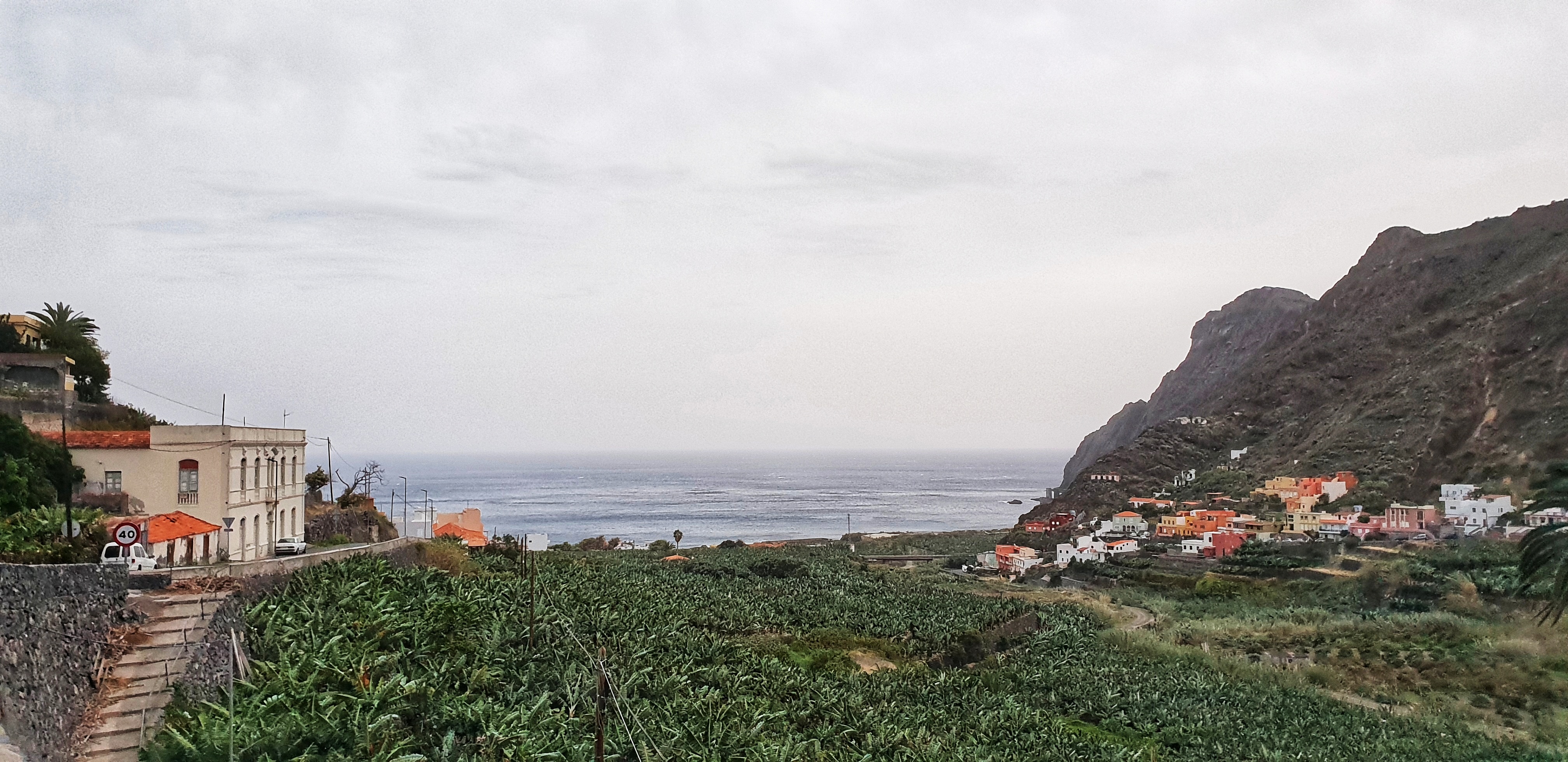 Hermigua valley with colourful houses on each side and banana fields in the middle