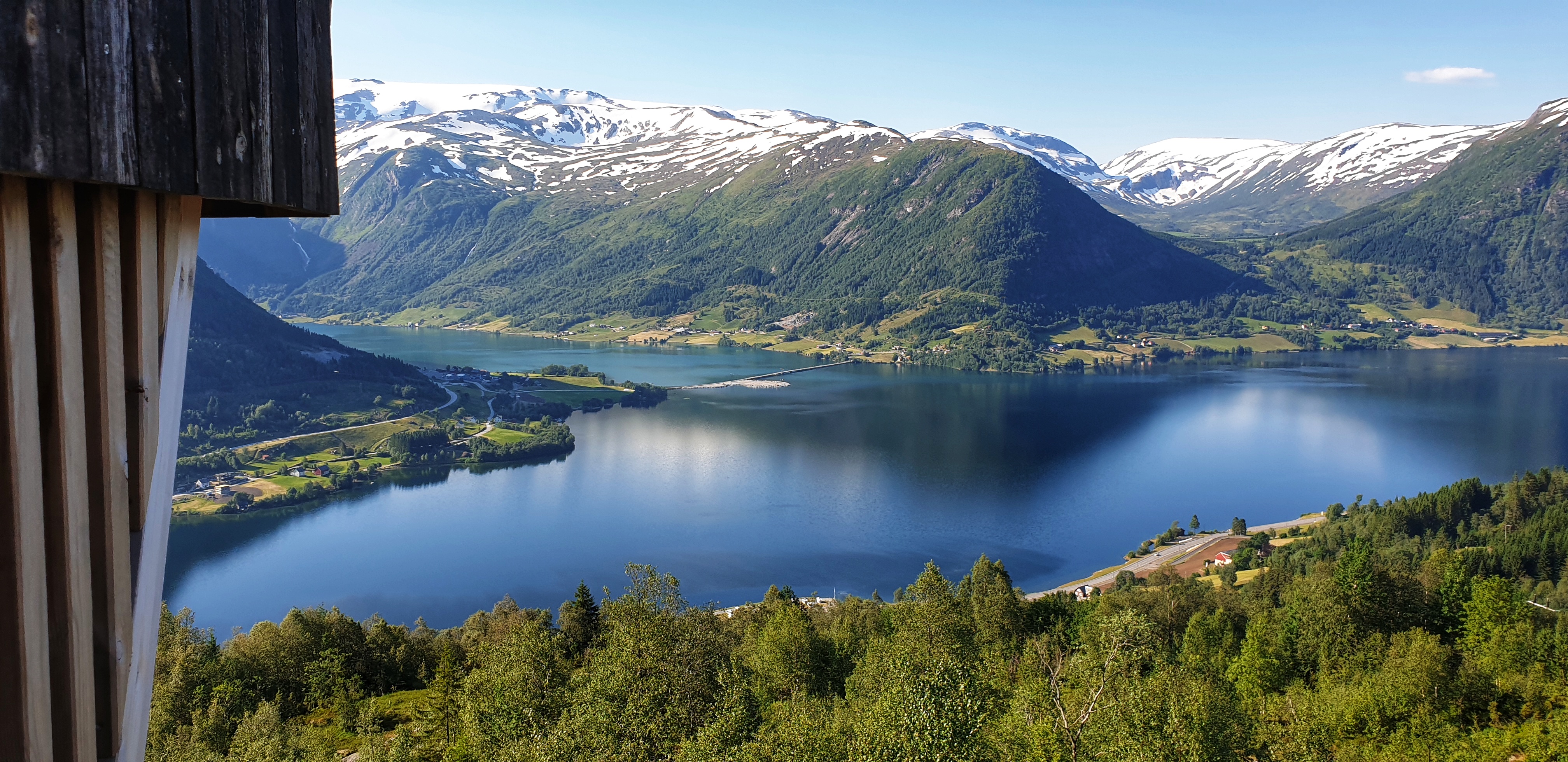 View from Dagsturhytta in Skei towards JØlstravatnet and KjØsnesfjorden on a sunny day.