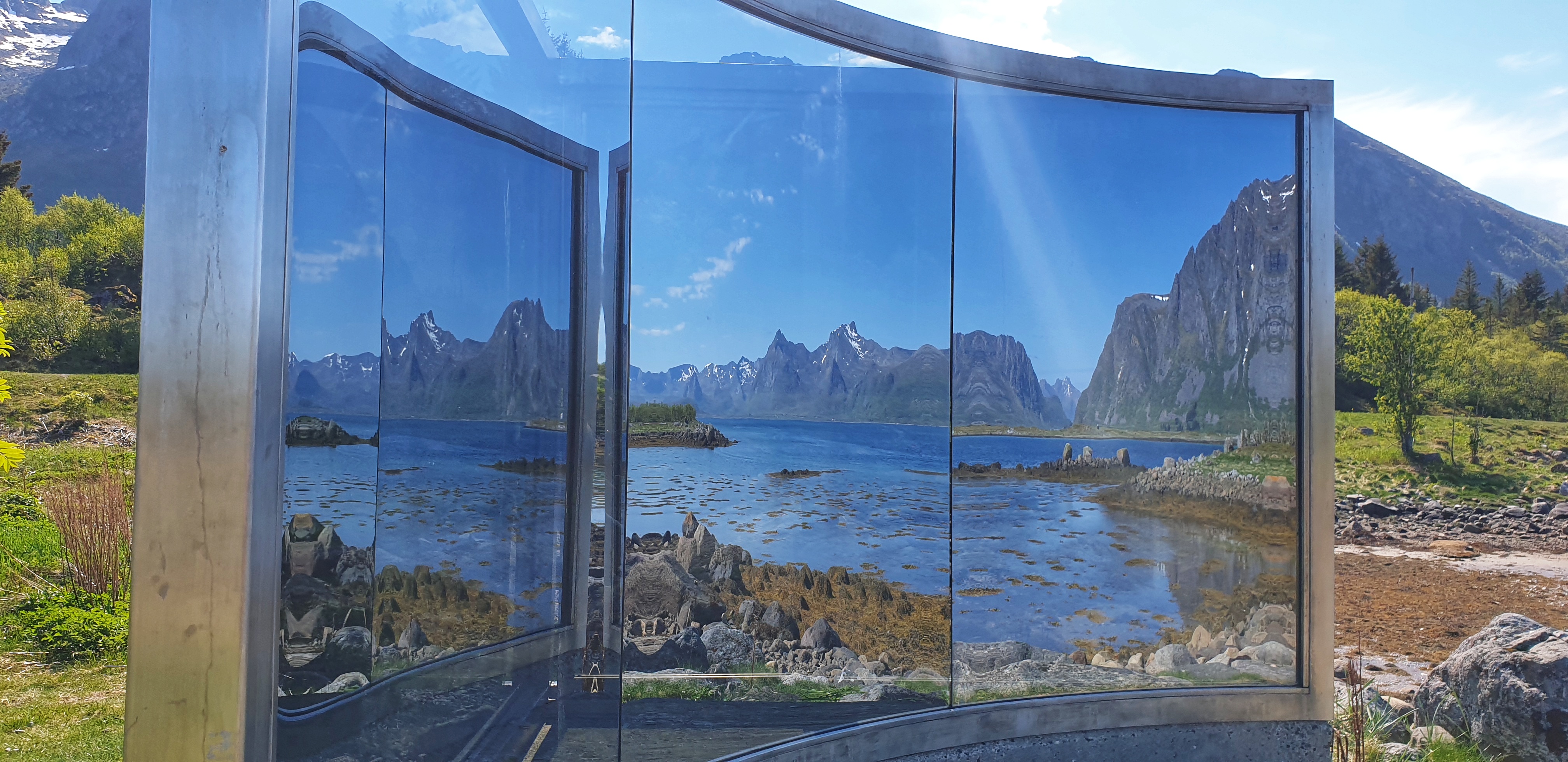 Mirrored view of mountains and sea in Lofoten in an art installation.