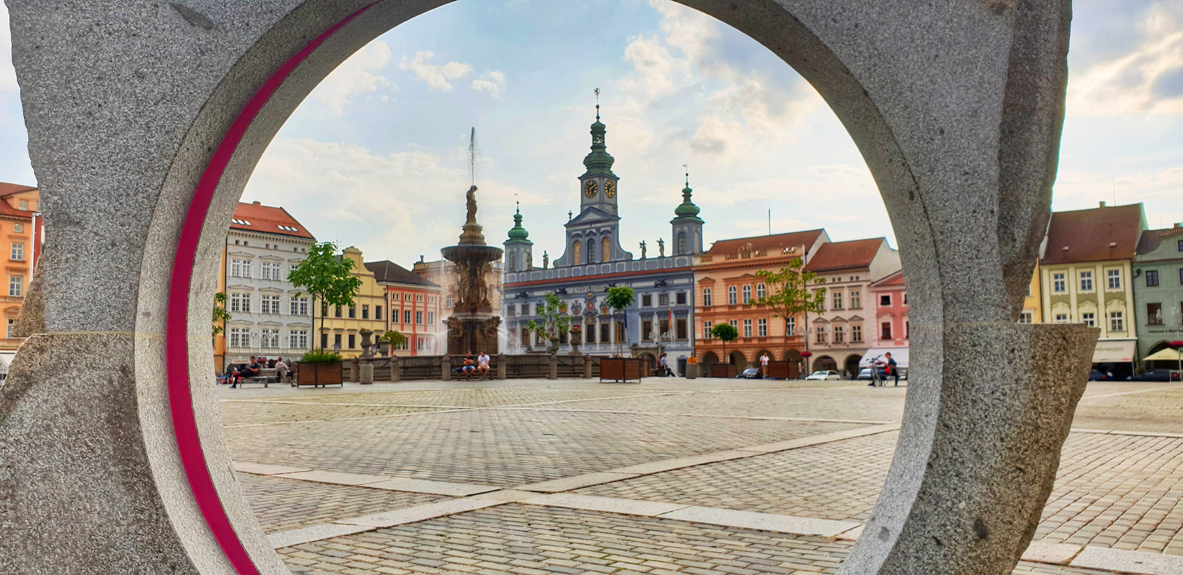 ?eské Bud?jovice's beautiful town square surrounded by pastel coloured buildings