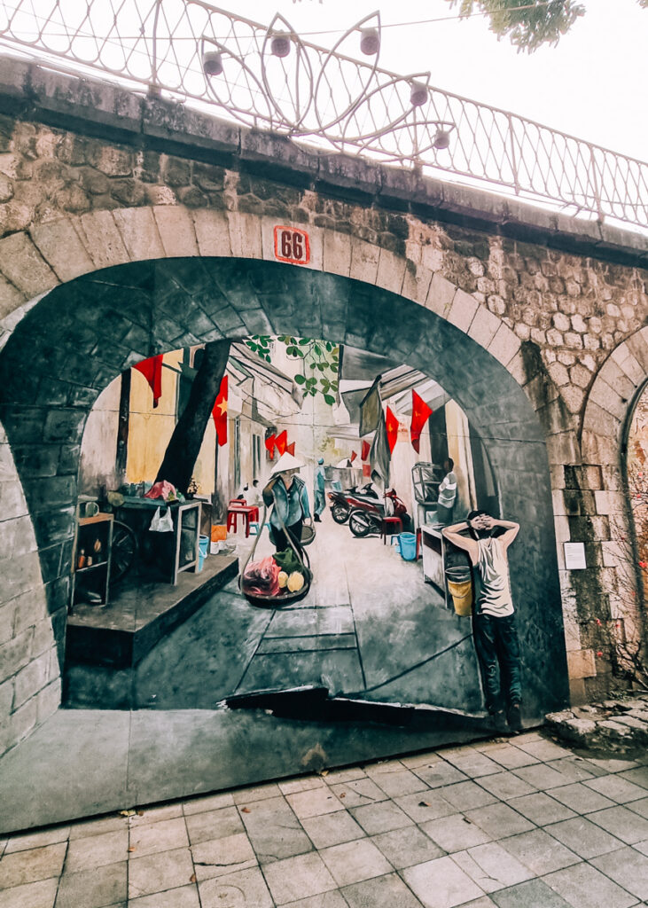 A mural of a daily life scene from a street in Hanoi.