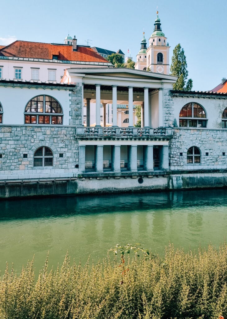 The old Market Hall in Ljubljana see across the river Ljubljanica.