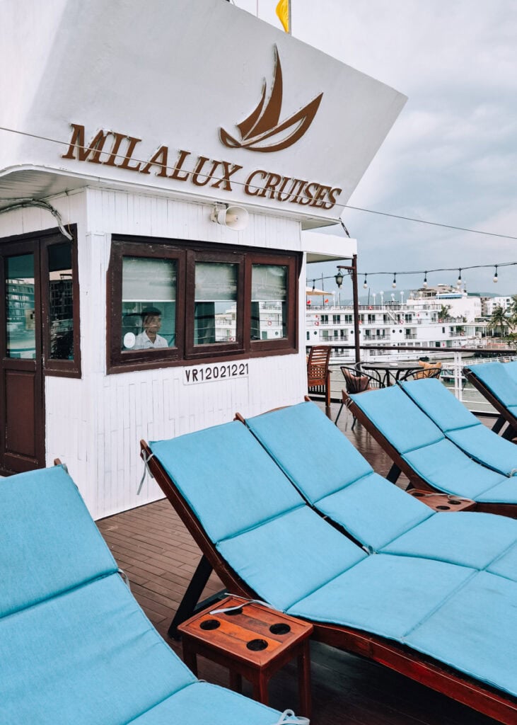 The front top deck on MilaLux Cruise with sun loungers with blue matresses.