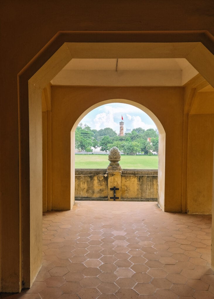 The Hanoi flag tower seen from inside a building at the Thang Long Citadel.