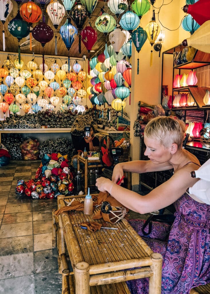 I am focused on a lantern workshop in Hoi An.