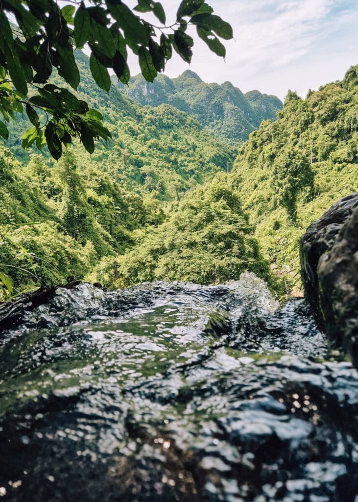 View of Phong Nha National Park from the top of a small waterfall.