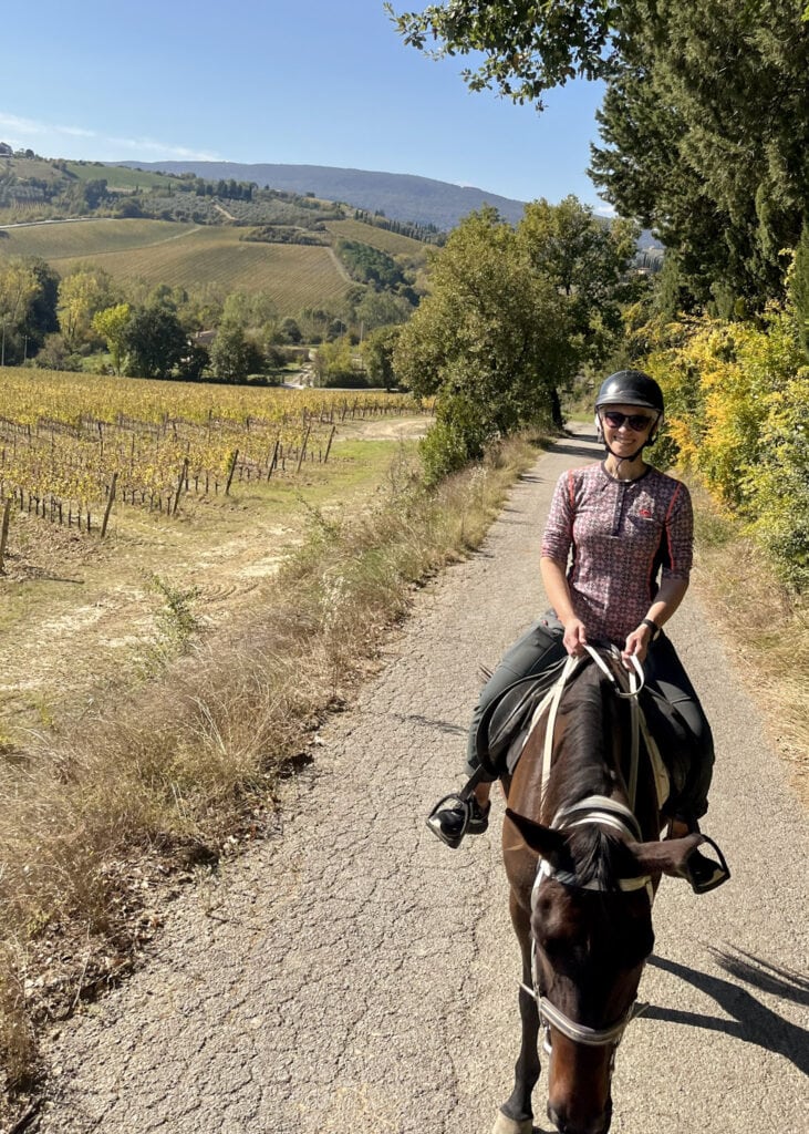 Me (Anne) riding along wines.